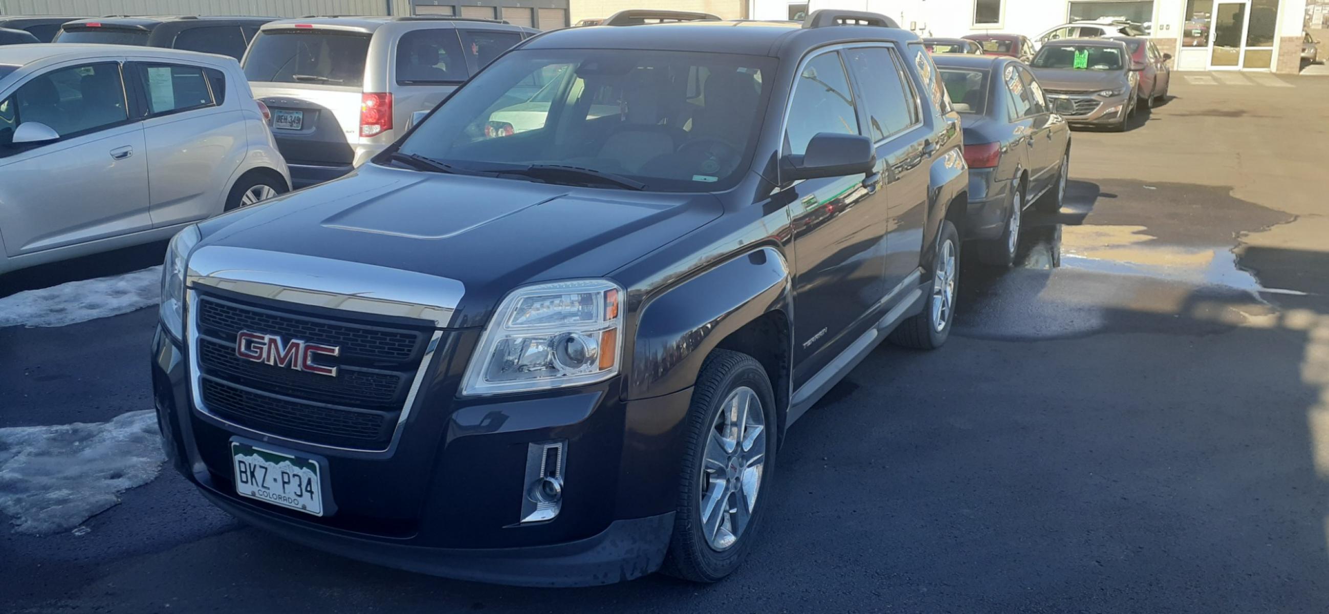 2015 GMC Terrain SLT1 AWD (2GKFLXE33F6) with an 3.6L V6 DOHC 24V engine, 6-Speed Automatic transmission, located at 2015 Cambell Street, Rapid City, SD, 57701, (605) 342-8326, 44.066433, -103.191772 - Photo #2
